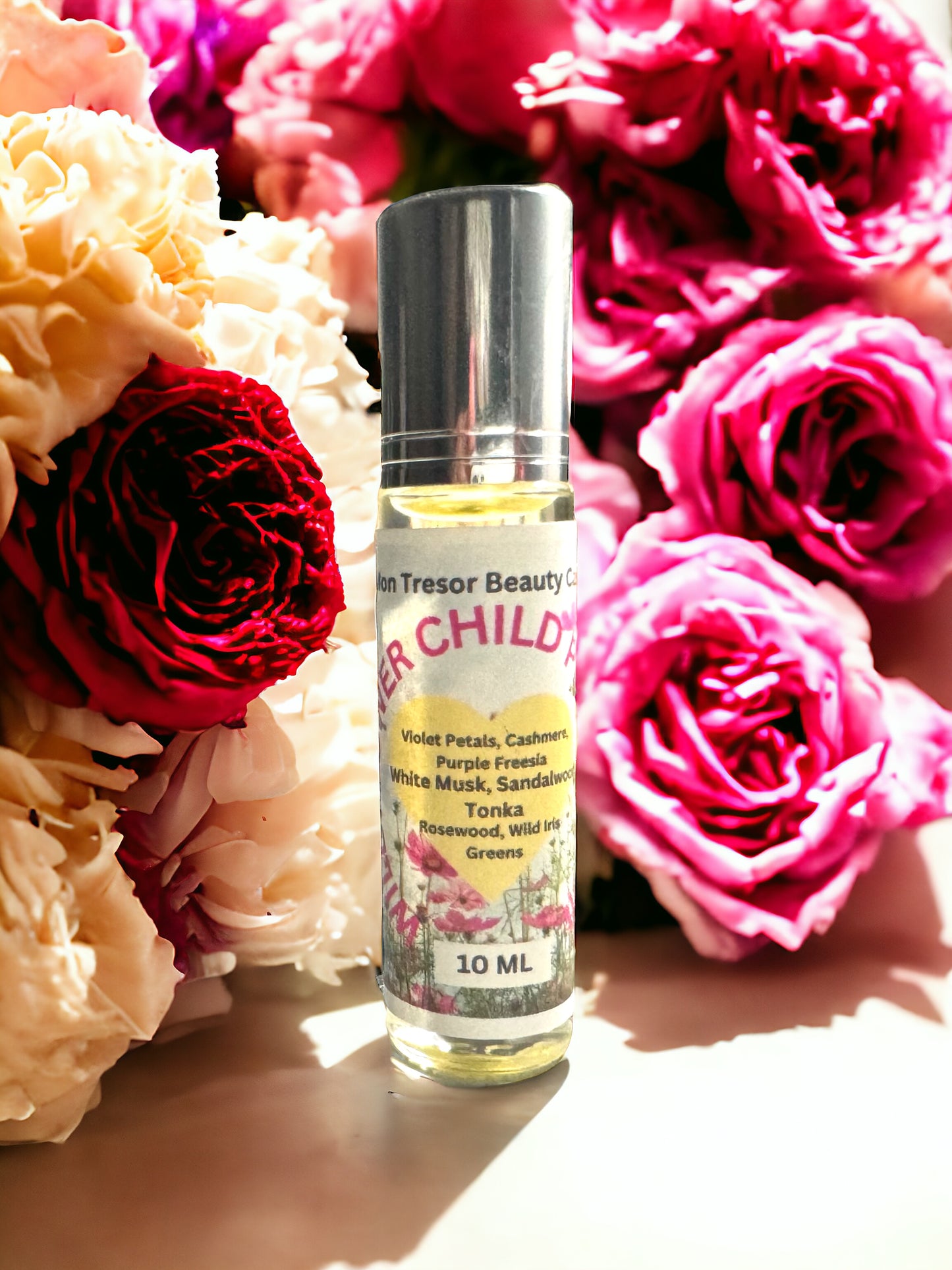 Wildflower Child Perfume Oil, Tonka, purple freesia, wild iris, rosewood, violet petals, greens, cashmere, white musk, natural perfume, alcohol free, cruelty free, vegan friendly, women’s perfume, layering perfume,