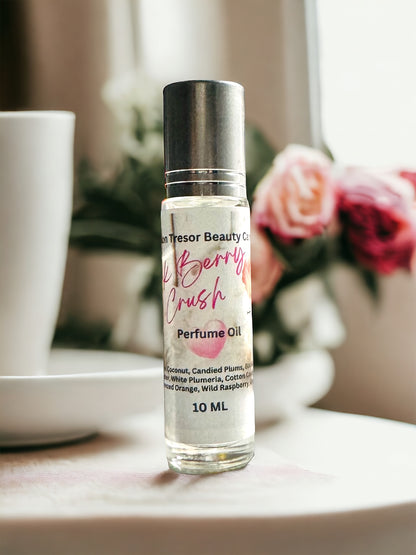 Pink Berry Crush perfume oil, crushed pink coconut, wild raspberry, cotton candy musk, candied plums, soft amber, squeezed orange, white plumeria, blackberry musk, natural perfume, vegan friendly, cruelty free, woman’s perfume, layering perfume Floral